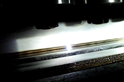 De-coating process control with LIBS